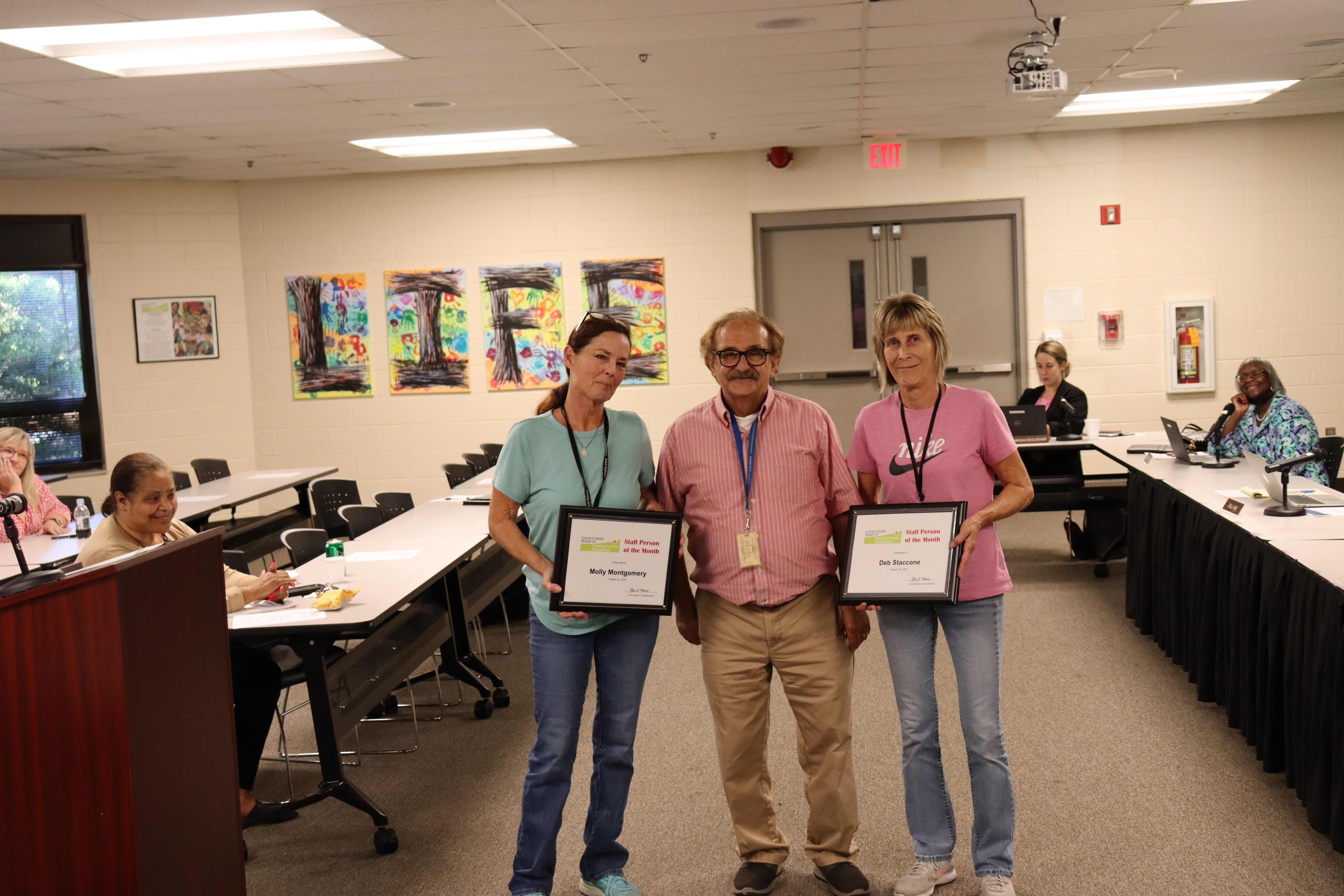 Molly Montgomery, left, and Deb Staccone with Capital Projects Manager Nick Bruno. Priscilla Green was unable to attend the meeting.