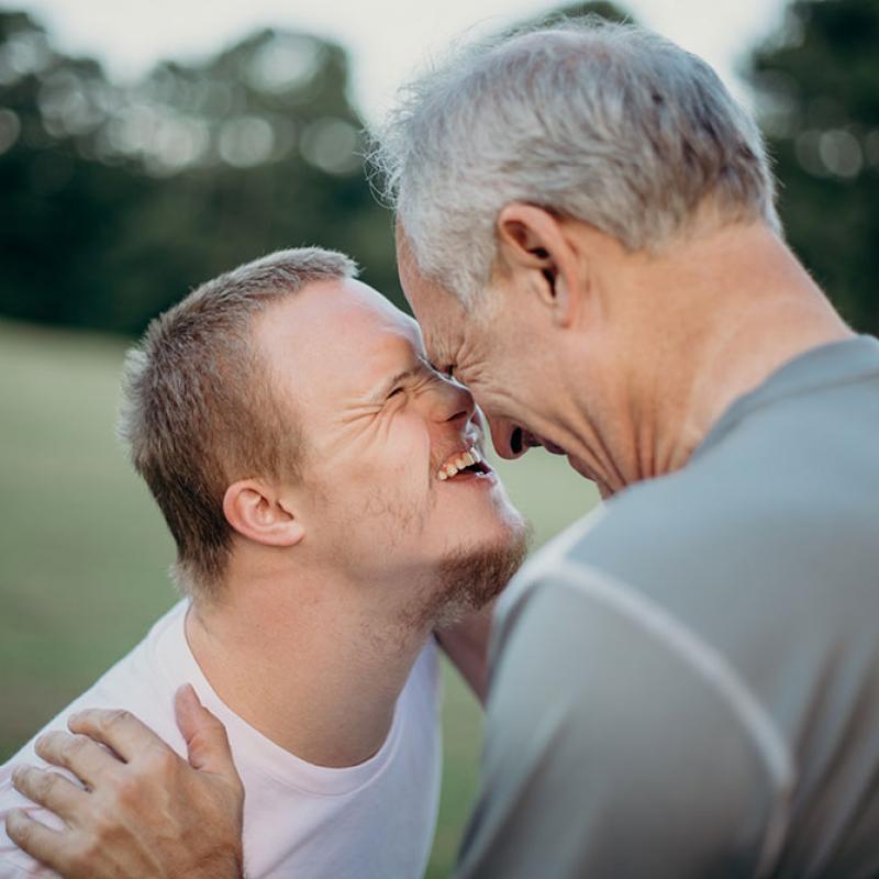 A Father and Son Smiling