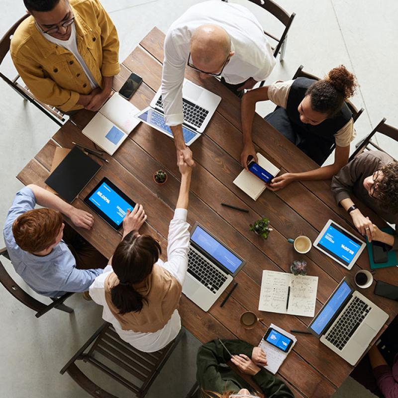 Group of People on Computers at a Table