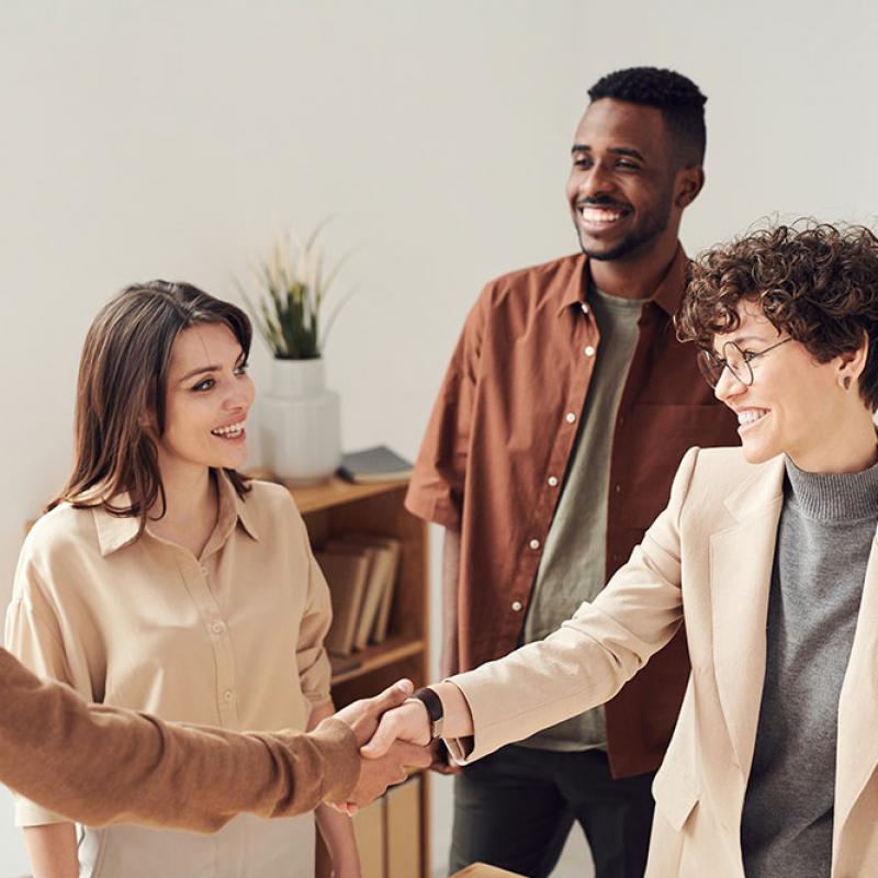 Group of People Shaking Hands