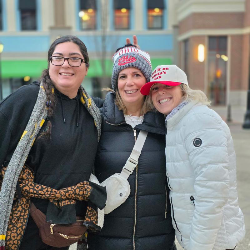 Female provider with a female individual and daughter in a winter scene