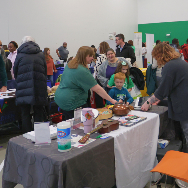 People at the Inclusion Fair looking at services
