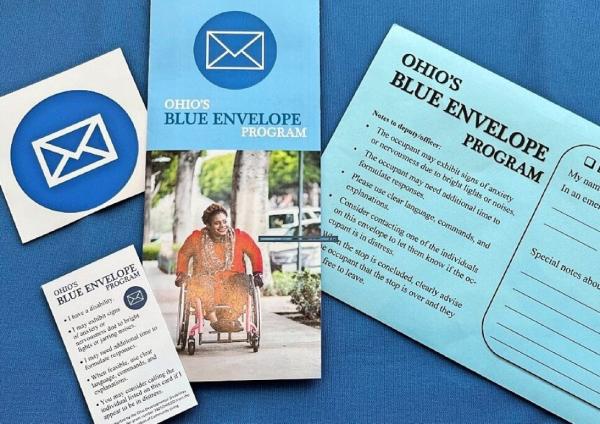 Photo of things in the Blue Envelope Program materials